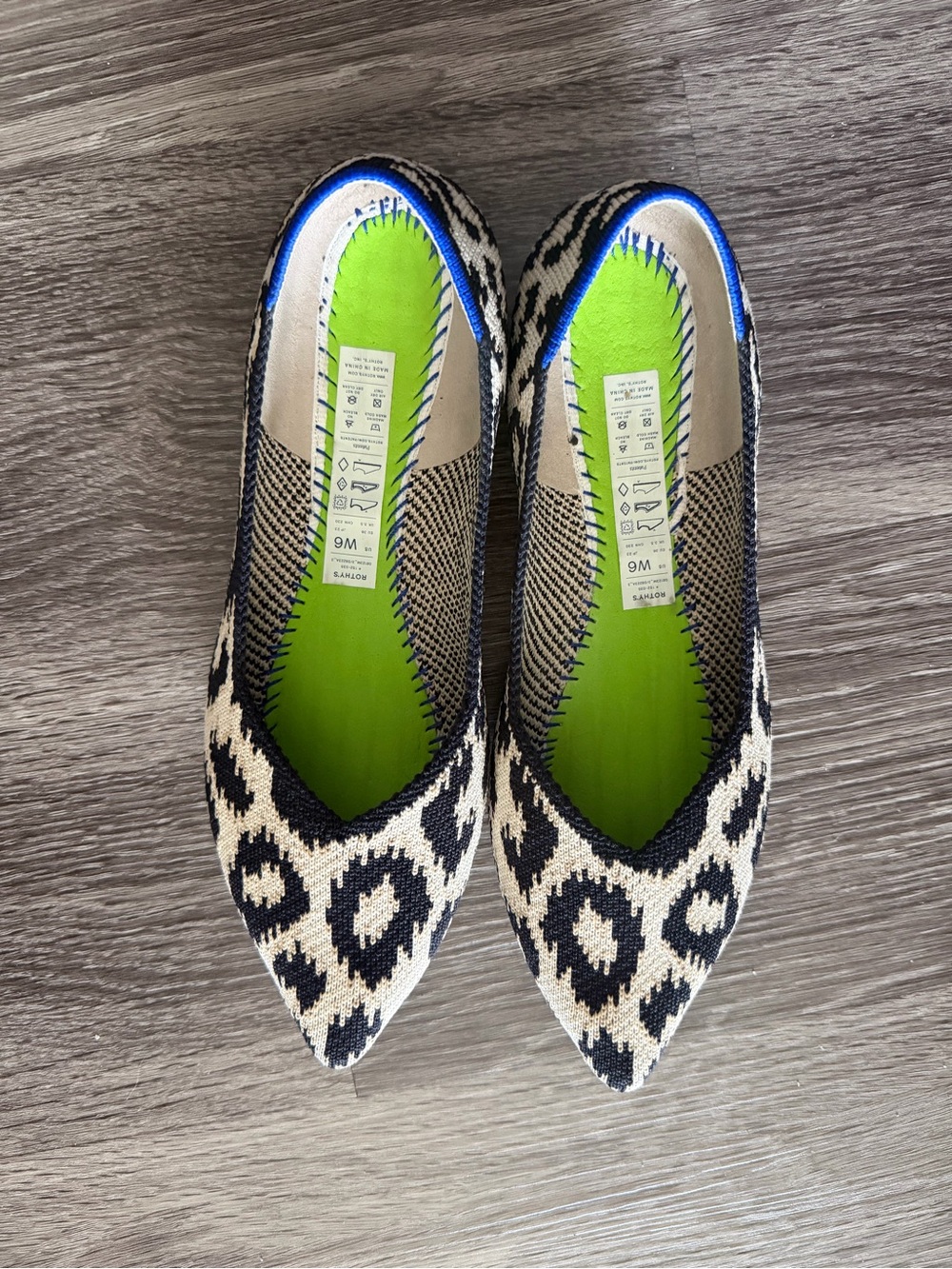 Rothy’s Pointed Leopard-Print Knit Flats in Black and Cream